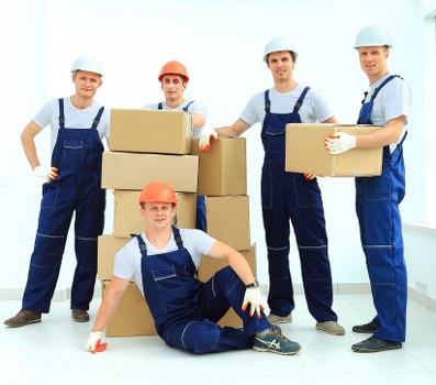 Office items and boxes arranged for a small removals job in Rotherhithe