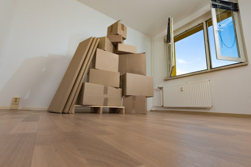 Office removals planning in Rotherhithe with packed moving boxes